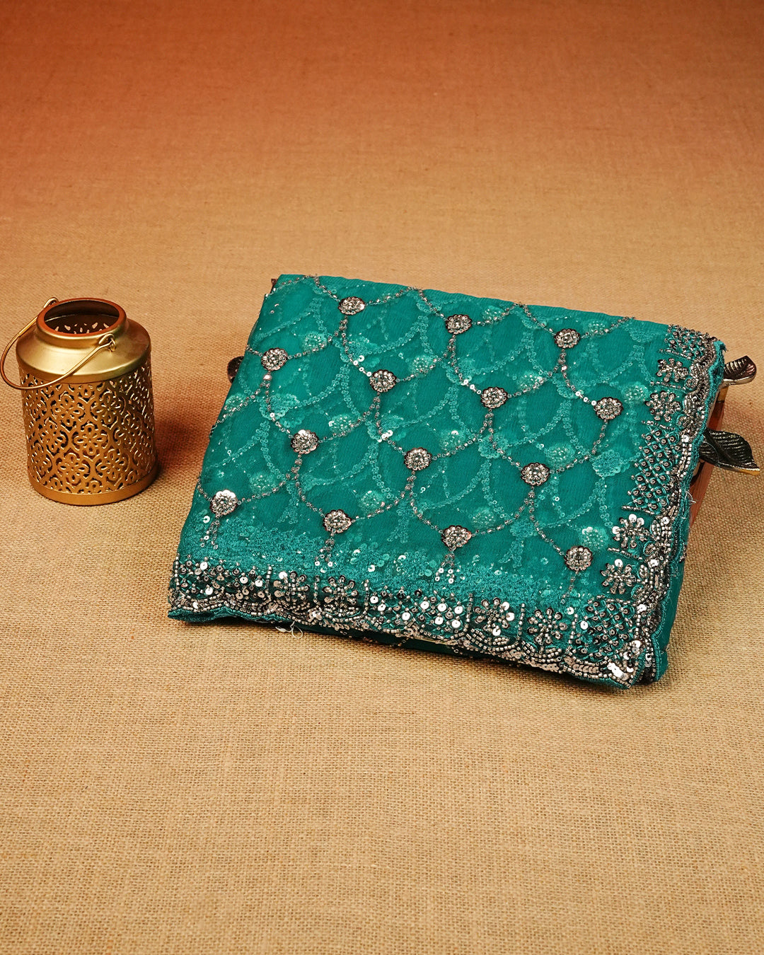 Teal colour Net Designer saree featuring Beats & Sequins geometric Pattern on body & worked border, comes with matching blouse piece.