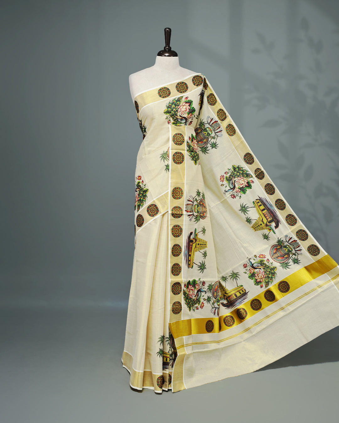 Cream colour Tissue Kerala saree Featuring An Elegant body, complemented by a classic gold zari with Indian Art form print on border, matching blouse piece.
