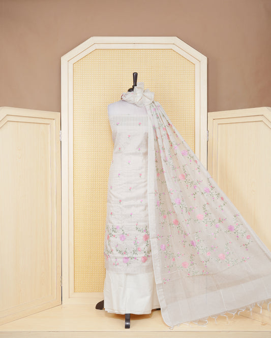 Cream colour tissue salwar material featuring striped body with elegant floral Thread Work, paired with a matching bottom and an elegant dupatta.