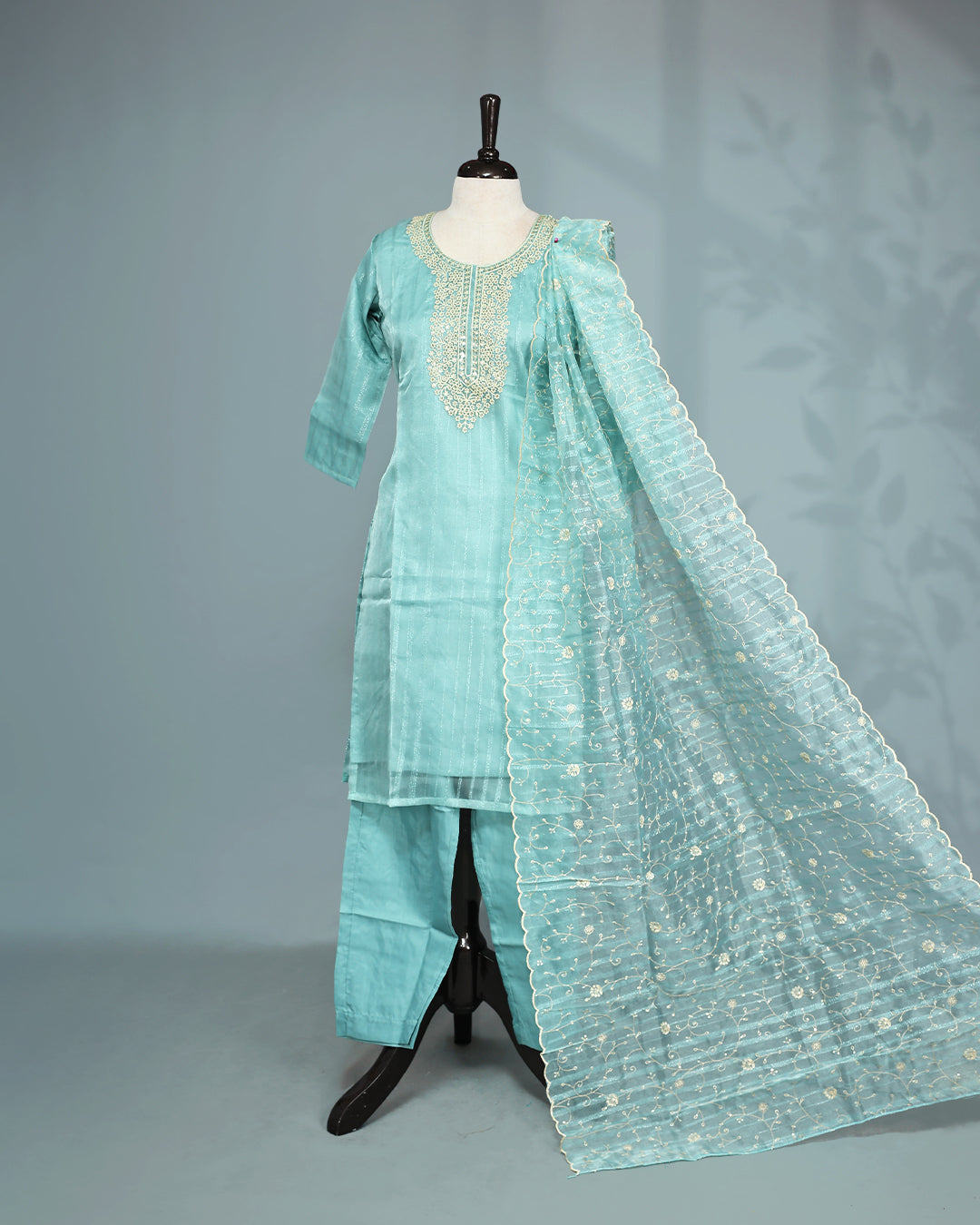 Mint colour salwar set with Sequins & thread work on top, paired with matching bottom & Dupatta.