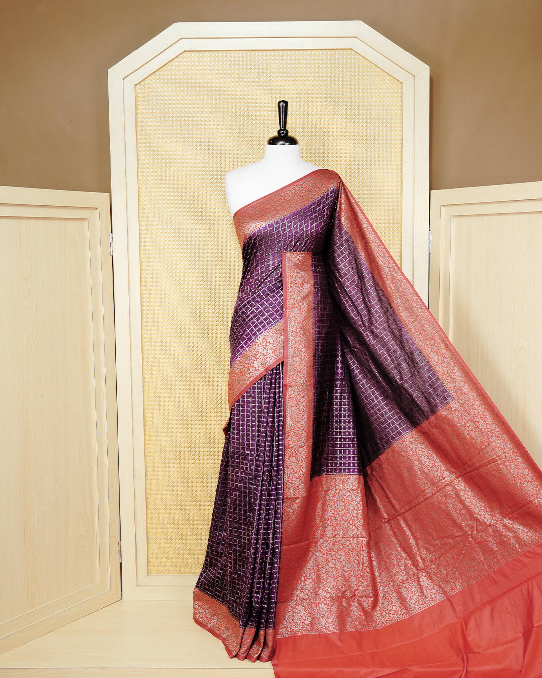 Vibrant purple Colour Semi georgette Saree having zari dotted check pattern on body, contrast Brick orange colour floral kodi designed Border, Rich Pallu comes with Matching Blouse piece.