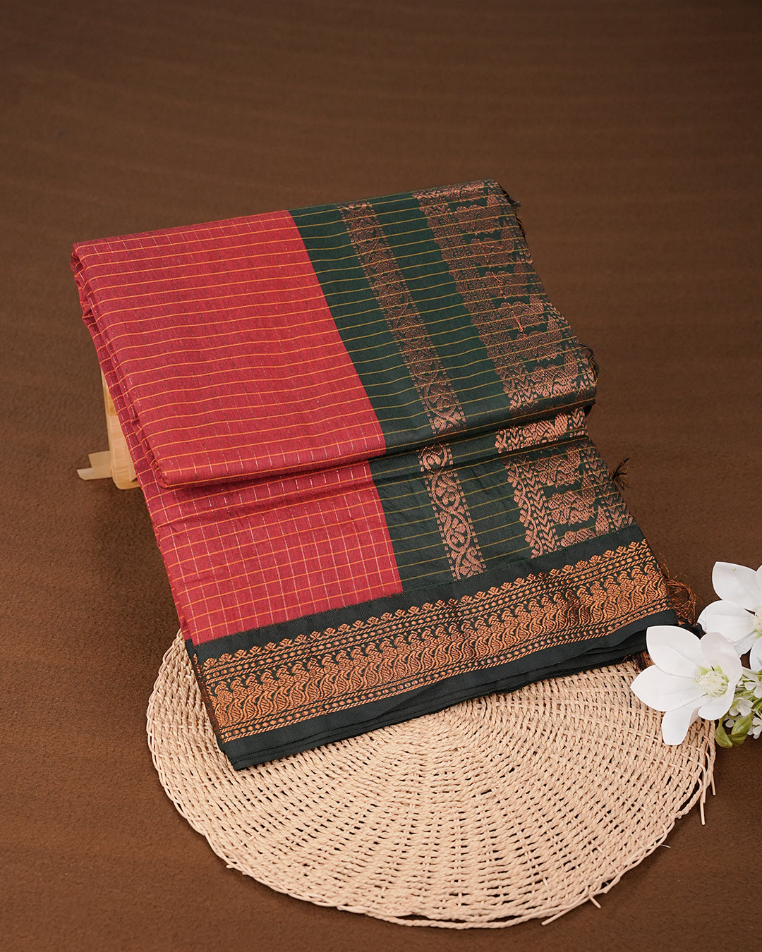Maroon colour kalyani cotton saree featuring gold zari check pattern on body, complemented by Green colour with Antique zari border, paired with matching blouse piece