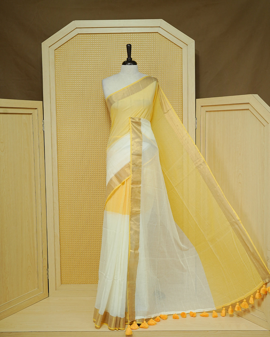 Yellow & White Colour Half & Half Mul cotton saree Complemented by contrast Green colour Border & tassels.