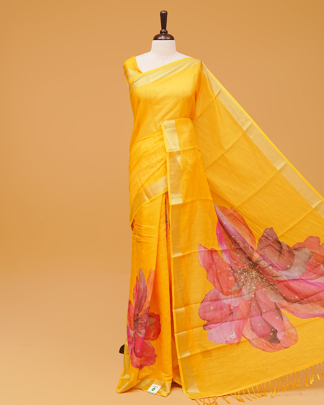 Sunny Yellow Colour Semi Linen Saree featuring Bold Flower prints, paired with matching blouse piece.