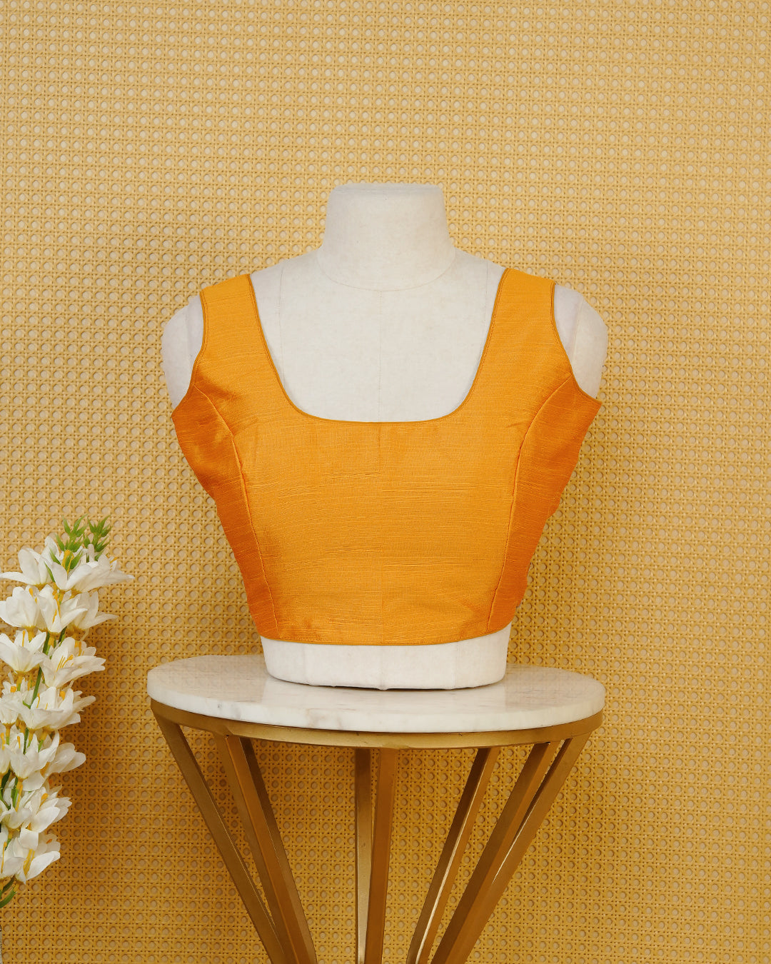 Mustard Colour Plain Blouse Featuring A Classic U Neckline, Sleeveless Design, And A Simple, Clean Finish.