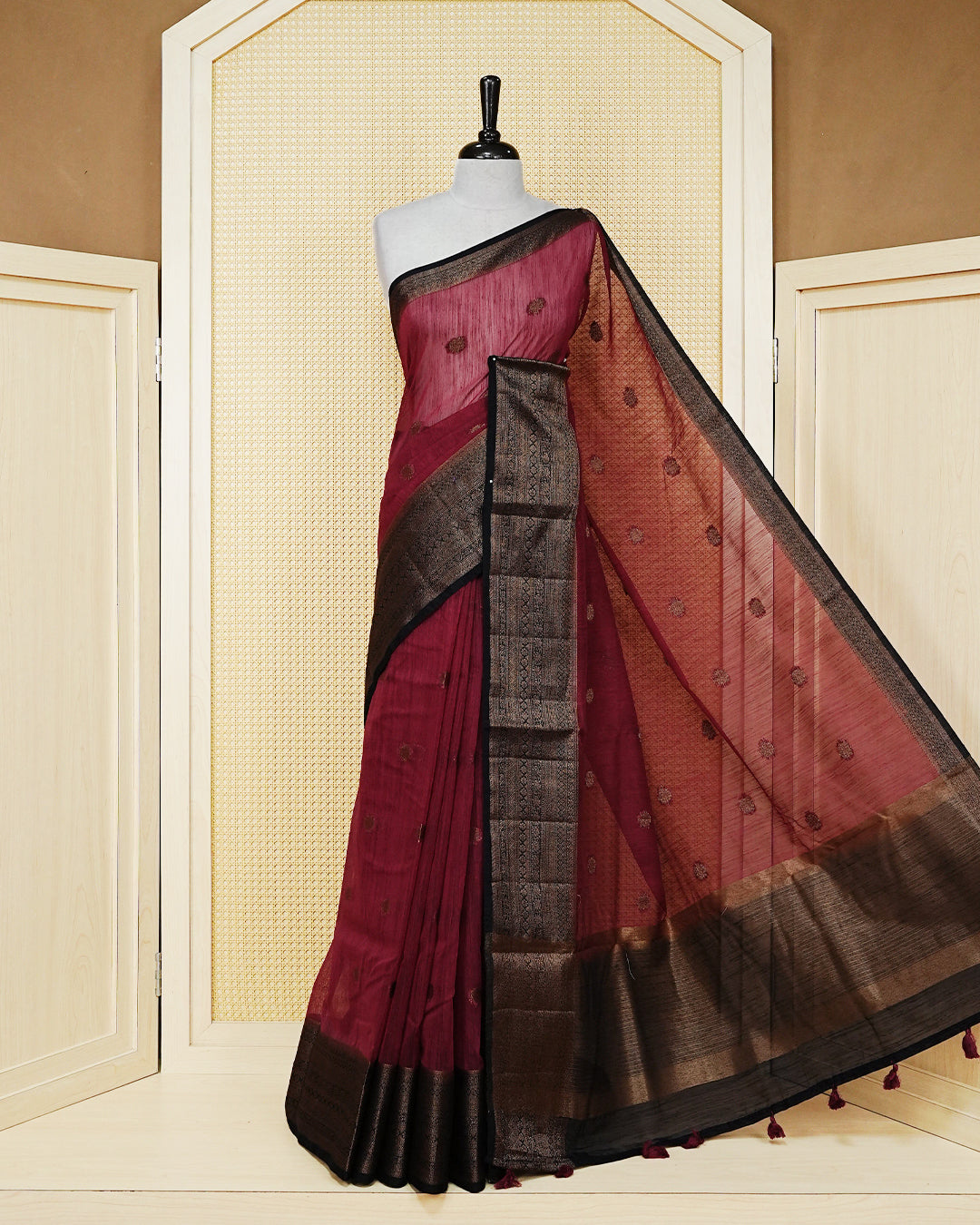 Maroon colour semi linen saree thread motifs on body, contrast dark colour gold zari border, rich pallu comes with matching blouse piece
