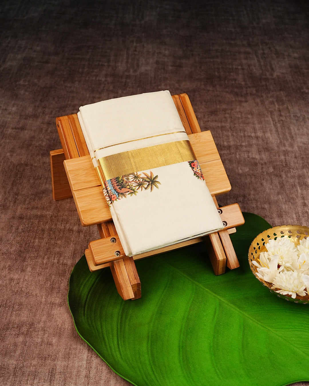 Cream Coloured Cotton Double Dhoti Finished with Onam Themed Prints & Gold Kara