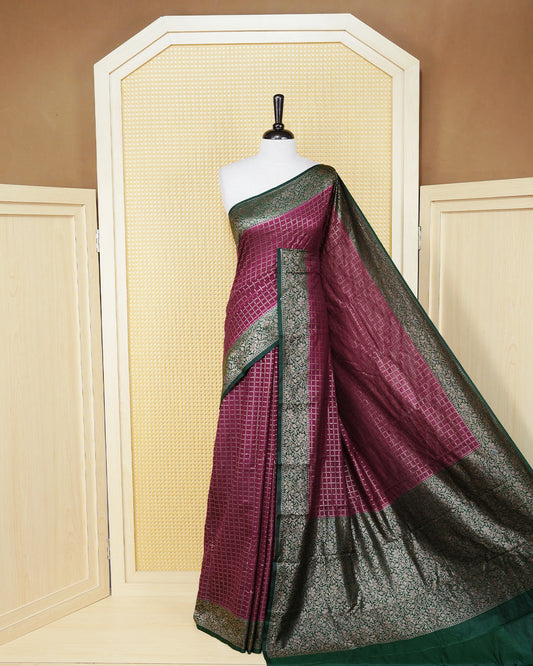 Royal purple Colour Semi georgette Saree having zari dotted check pattern on body, contrast dark forest green colour floral kodi designed Border, Rich Pallu comes with Matching Blouse piece.