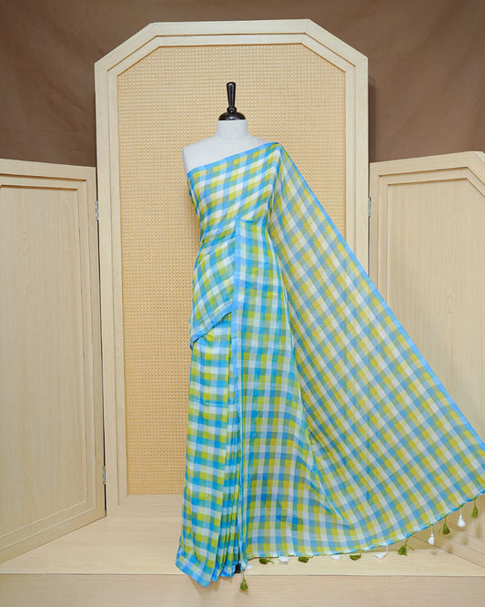 Green, Blue & white Mul cotton saree featuring Small Check pattern across body, complemented by Elegant Tassels.