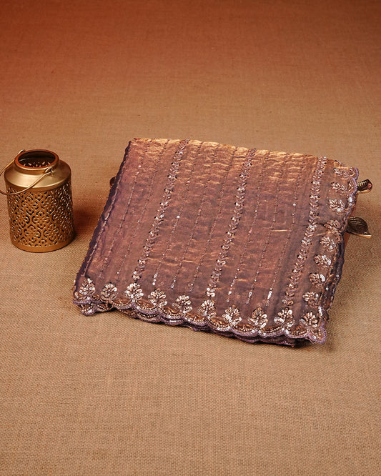 Brown colour Velvet chiffon designer saree featuring Sequins & cut beats strips on body and scallop border, comes with matching blouse piece.