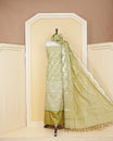 Olive colour salwar material featuring Gold and Silver Butta Design without border, paired with matching bottom and elegant dupatta.