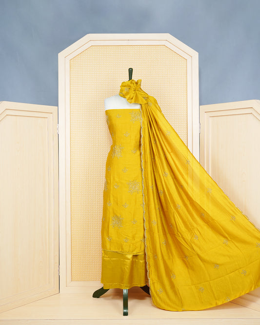 Mustard Yellow Georgette Salwar Matirial Features an Elegant Floral Embroidary Pattern Aborned With Shimmering metali Gold Thread Bead Work, Paired with matching bottom & elegant Dupatta