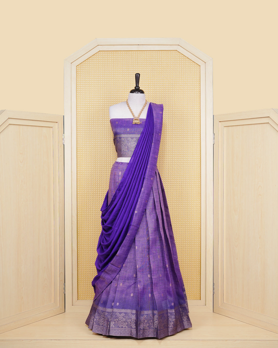Orchid purple & royal violet colour Linen Silk Semi stitched dhavani set featuring buttas, zari bordered skirt & blouse piece and dupatta.