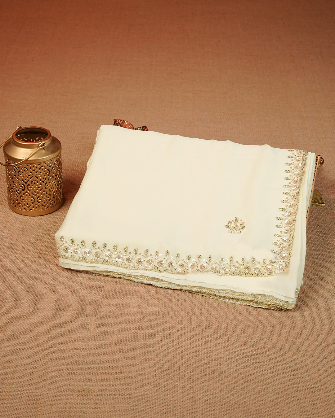 off white colour designer saree featuring beads & sequince works on border,comes with matching blouse piece.