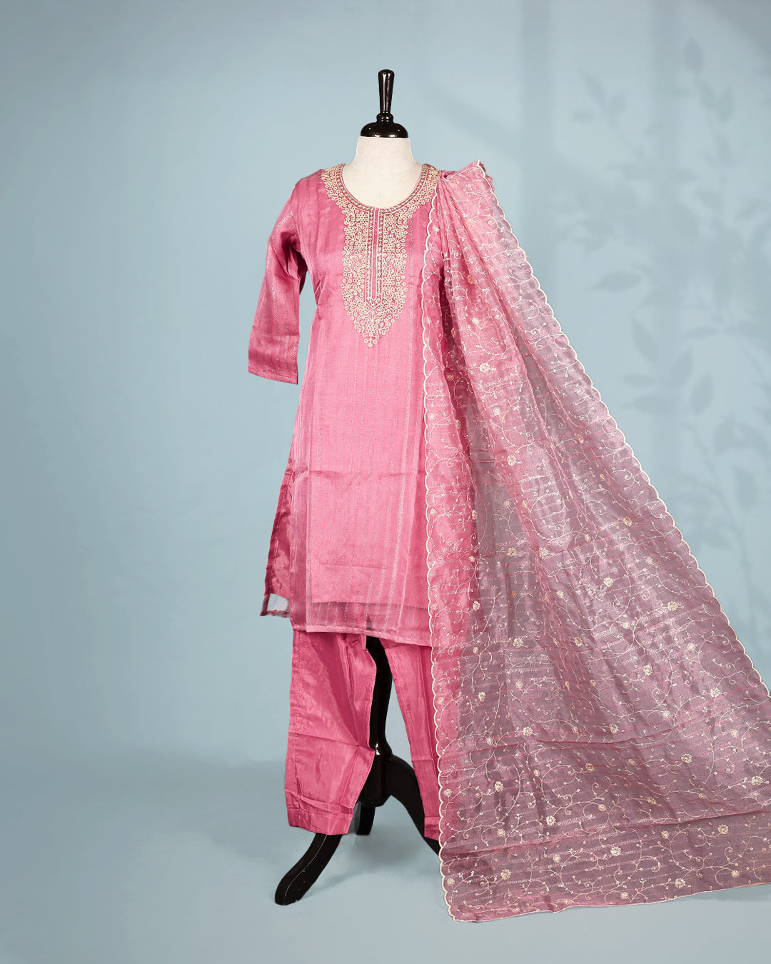 Pink colour salwar set with Sequins & thread work on top, paired with matching bottom & Dupatta.