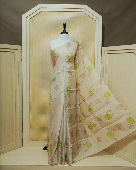 Green colour Semi tissue saree featuring elegant Rose print with delicate Mirror Work, beautiful Scallop border.