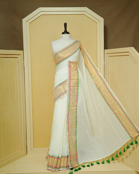 Off White Mul Cotton Saree featuring a gold zari striped border with pink and green accents, paired with a pallu and finished with green tassels.