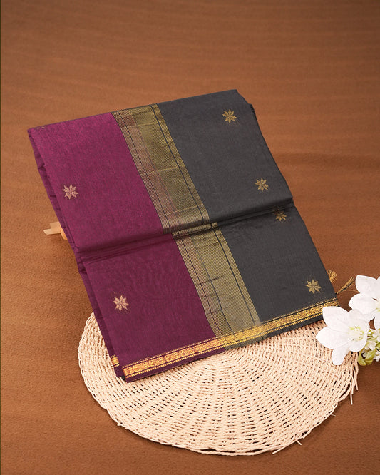 Magenta colour kalyani cotton saree featuring gold zari Floral pattern on body, complemented by  Black colour with Stripes & Floral Gold zari border, paired with matching blouse piece