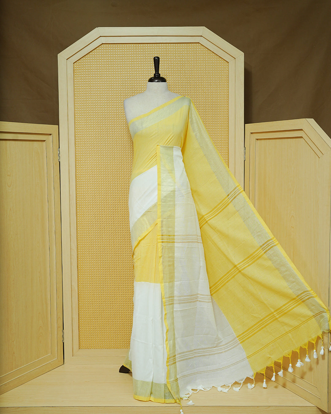 Yellow & White Colour Half & Half Mul cotton saree Complemented by contrast colour Gold Zari Border & tassels.