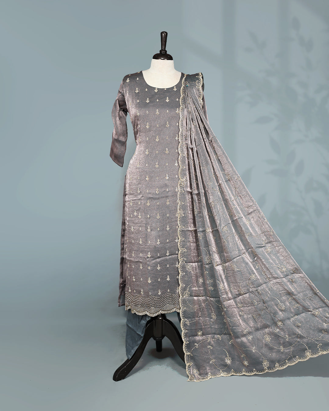 Grey colour salwar set with Stone work on top, paired with matching bottom & Dupatta.