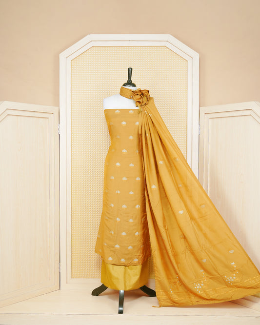 Dark yellow colour Banares Salwar material Featuring Gold and Silver zari floral motifs on body, paired with matching bottom & Elegant Dupatta