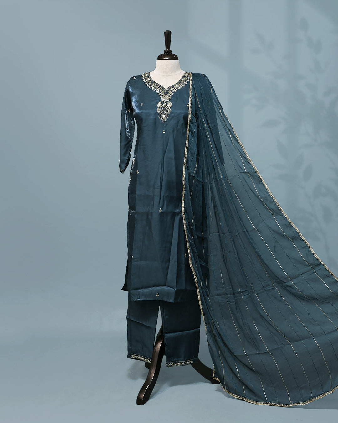 Teal colour salwar set with Stone work on top, paired with matching bottom & Dupatta.