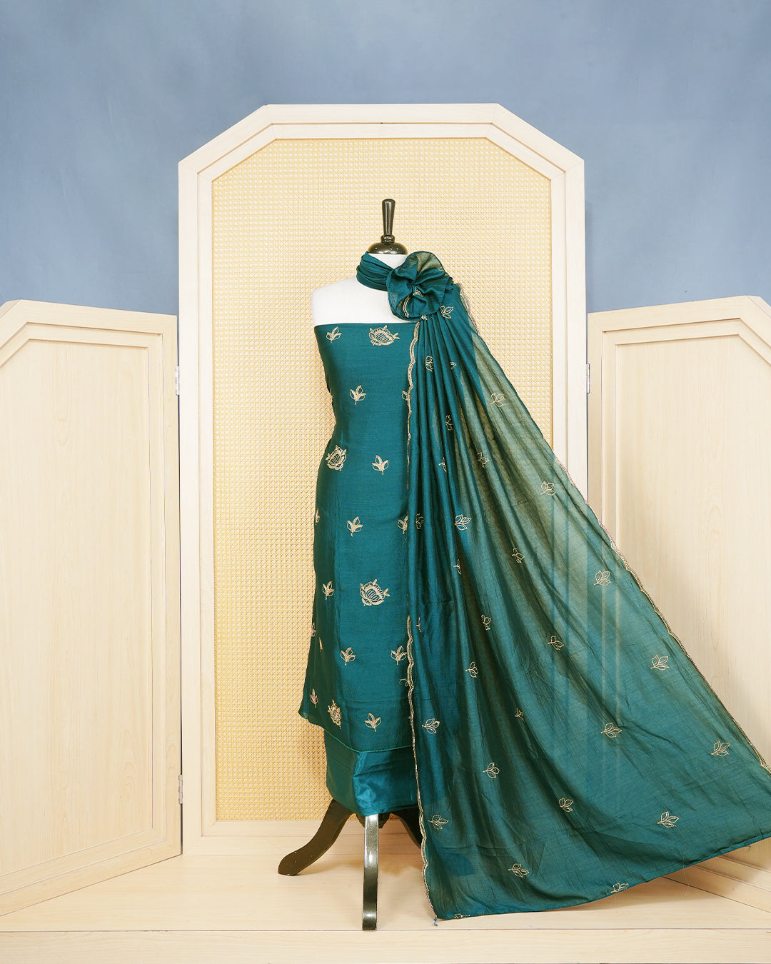 Dark Green Georgette Salwar Matirial Features an Elegant Floral Embroidary Pattern Adorned With Shimmering Metalic Gold Thread and Bead Work, paired with matching bottom & elegant Duptta