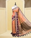 Copper & gold double shade Mulberry silk saree featuring floral gold zari patterns on body, paired with contrast purple colour with traditional border, comes with matching blouse piece.