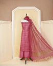 Maroon colour silk cotton salwar material featuring gold zari design without border, paired with matching bottom and beautiful dupatta.