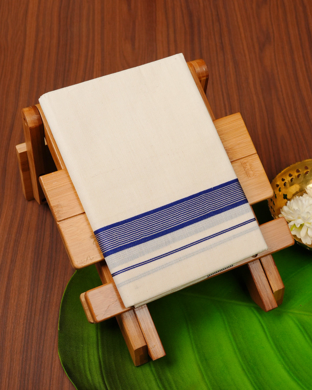 Cream colour cotton Single dhoti featuring Blue & silver border.