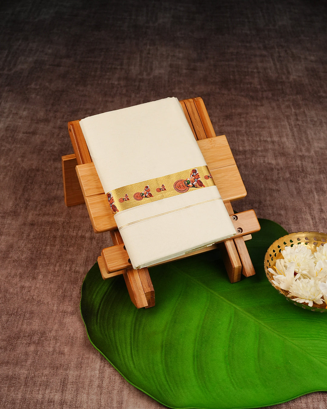 Cream Coloured Cotton Double Dhoti Finished with Kathakali Prints On Gold Kara