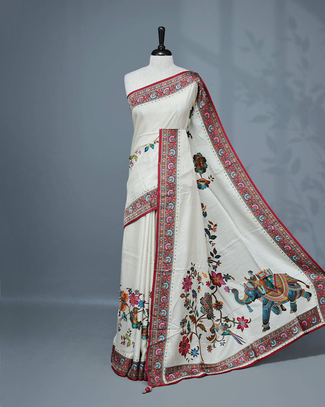Cream Colour Pashmina Saree featuring a Patterned body, complemented by Contrast Magenta colour with Floral pattern & gold zari on border and Pallu, comes with matching blouse piece.