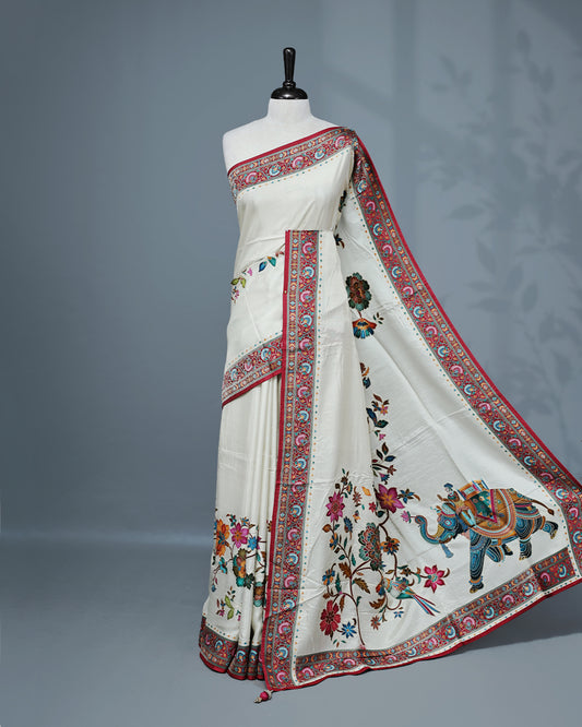 Cream Colour Pashmina Saree featuring a Patterned body, complemented by Contrast Magenta colour with Floral pattern & gold zari on border and Pallu, comes with matching blouse piece.