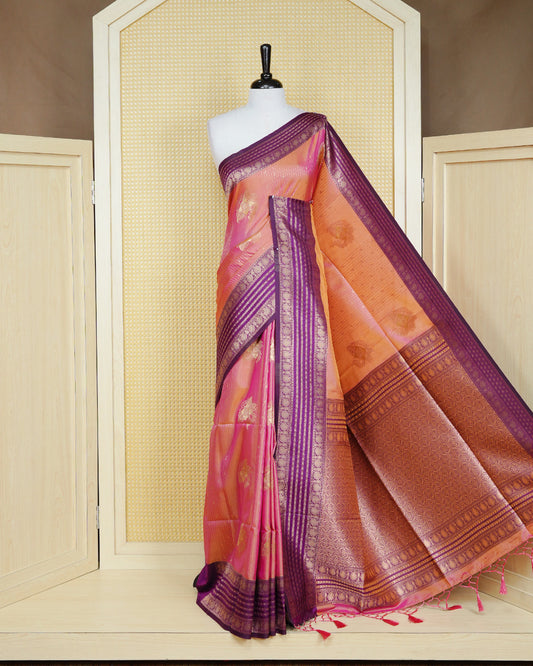 Golden Mustard Mulberry silk saree featuring gold floral zari patterns on body , paired with contrast purple colour with traditional border, comes with matching blouse piece.