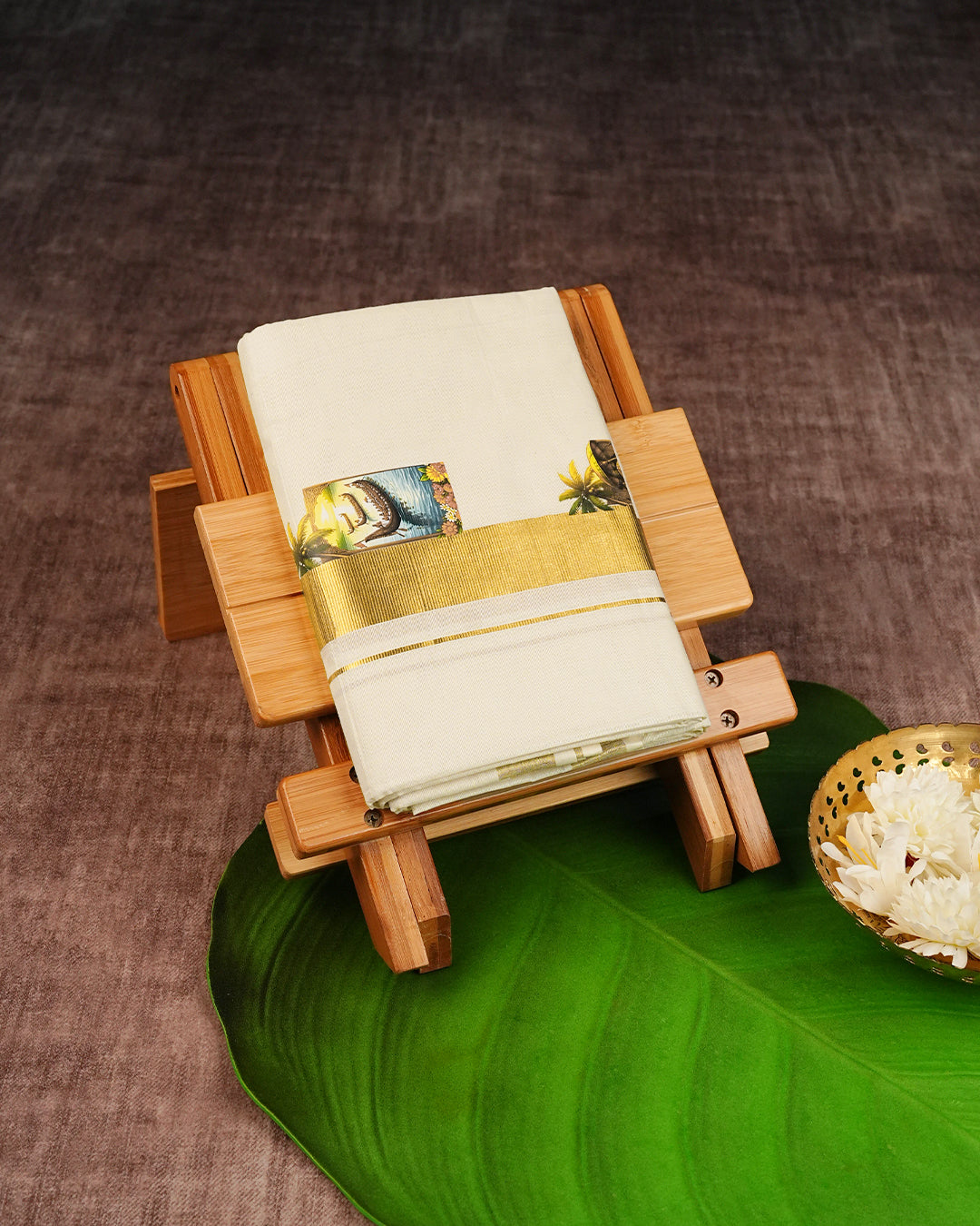 Cream Coloured Cotton Double Dhoti Finished with Traditional Kerala Cultural Prints & Gold Kara