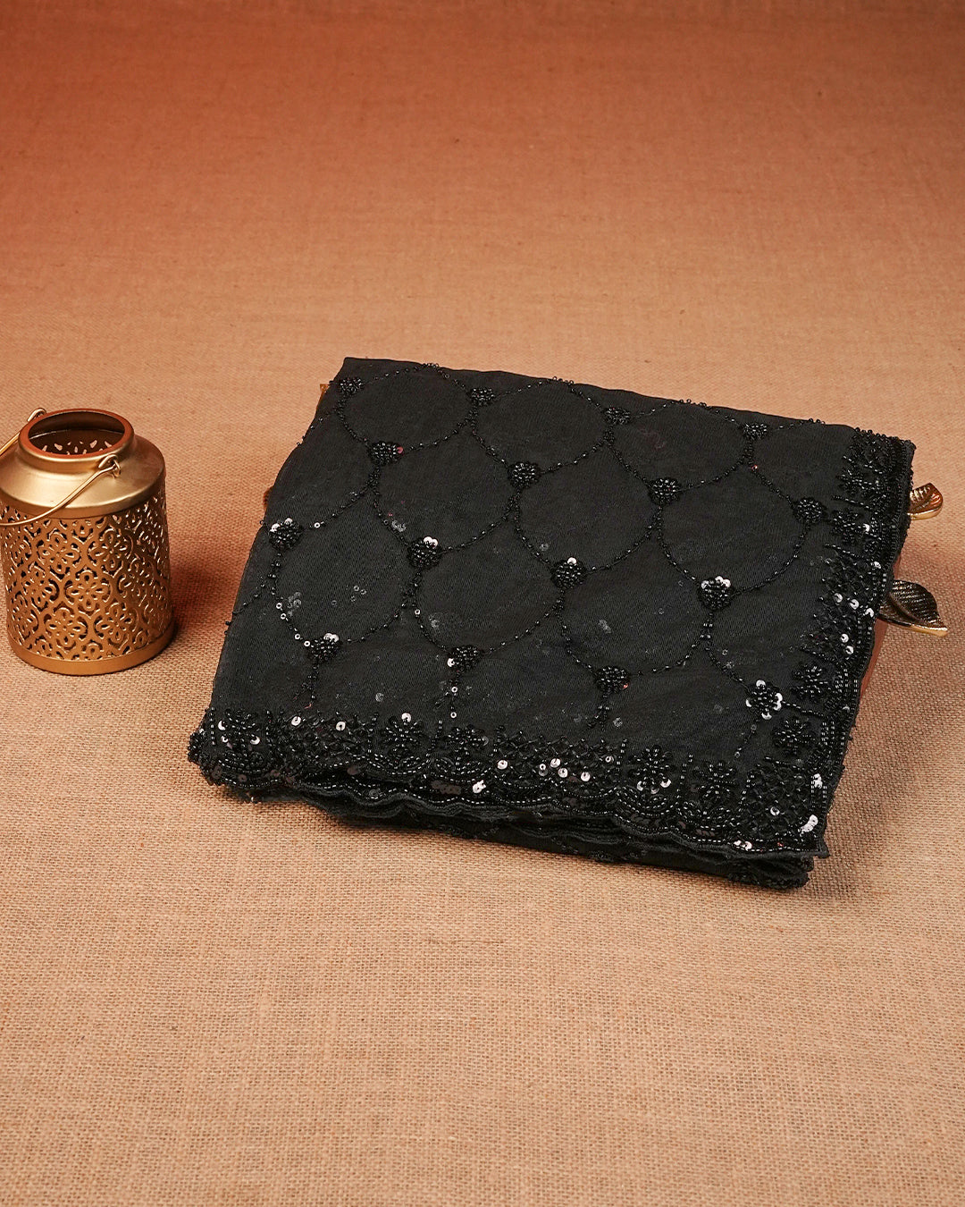 Black colour Net Designer saree featuring Beats & Sequins geometric Pattern on body & worked border, comes with matching blouse piece.