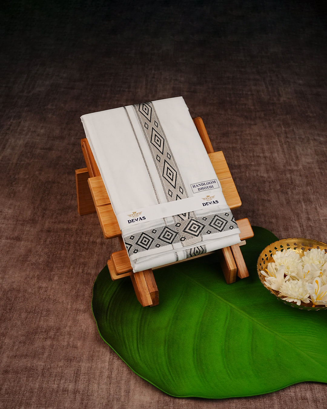 Off White Colour  Handloom Cotton Double Dhoti Finished With A Black Designed Pattern On Rose Gold kara.