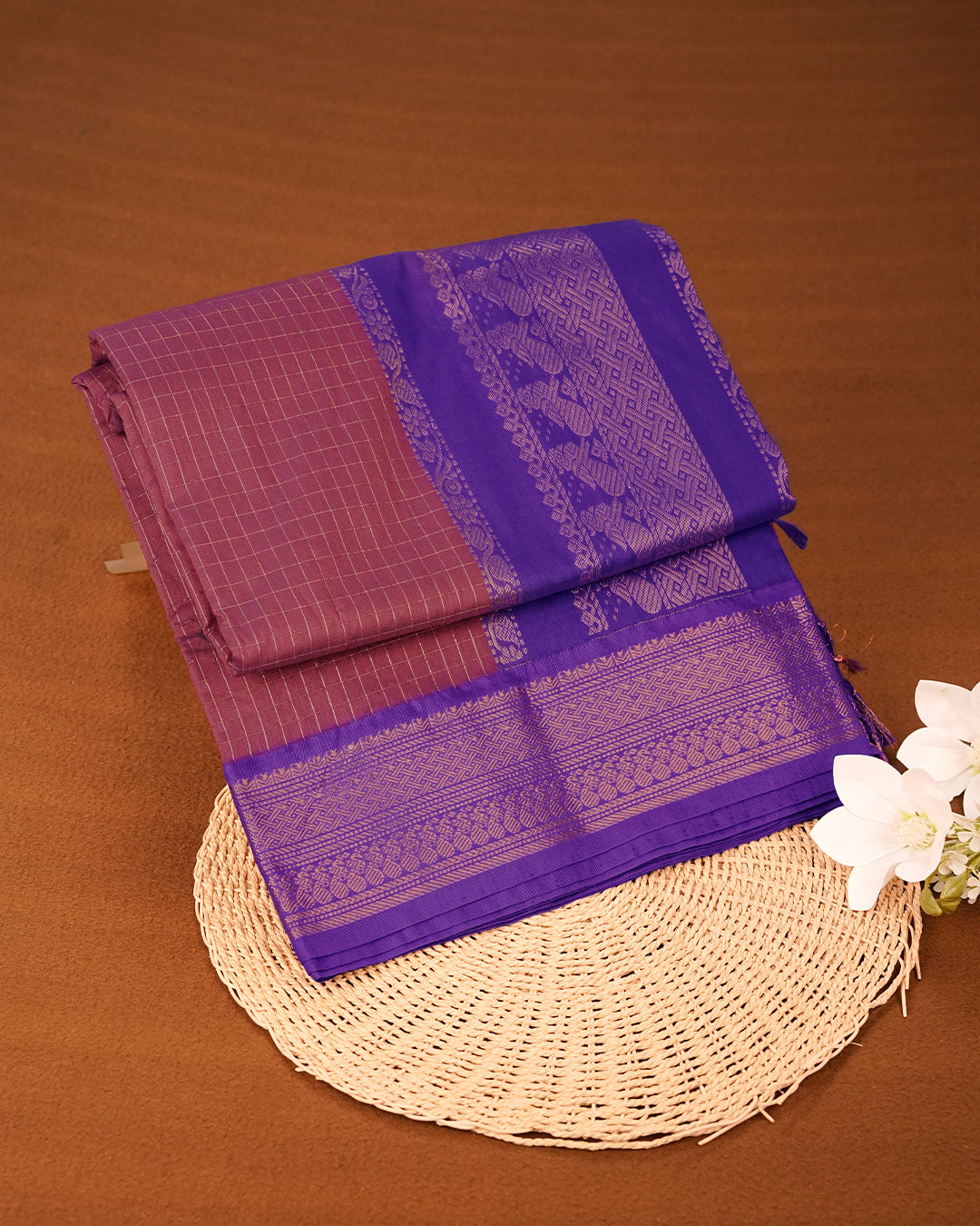Wine colour kalyani cotton saree featuring gold zari check pattern on body, complemented by Violet colour with Antique zari border, paired with matching blouse piece