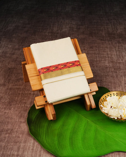 Cream Coloured Cotton Double Dhoti Finished with Elephant & Nettipattam Prints & Gold Kara