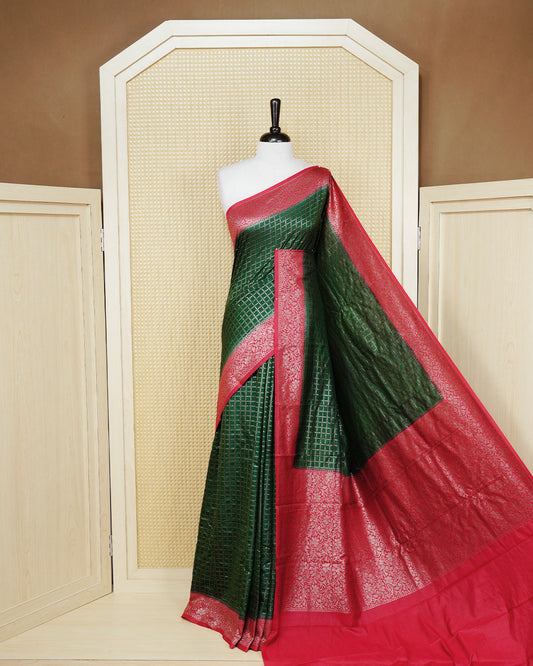 Forest green Colour Semi georgette Saree having zari dotted check pattern on body, contrast red colour floral kodi designed Border, Rich Pallu comes with Matching Blouse piece.
