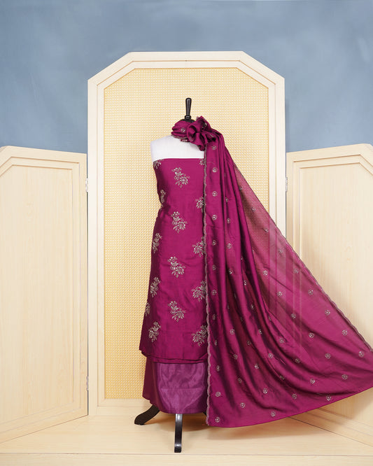 Magenta PInk Georgette Salwar Matierial Featuers an Elegant Floral Embroidary Pattern Aborned With Shimmering Metalic Gold Thread Work, Paired with matching bottom & elegant Dupatta