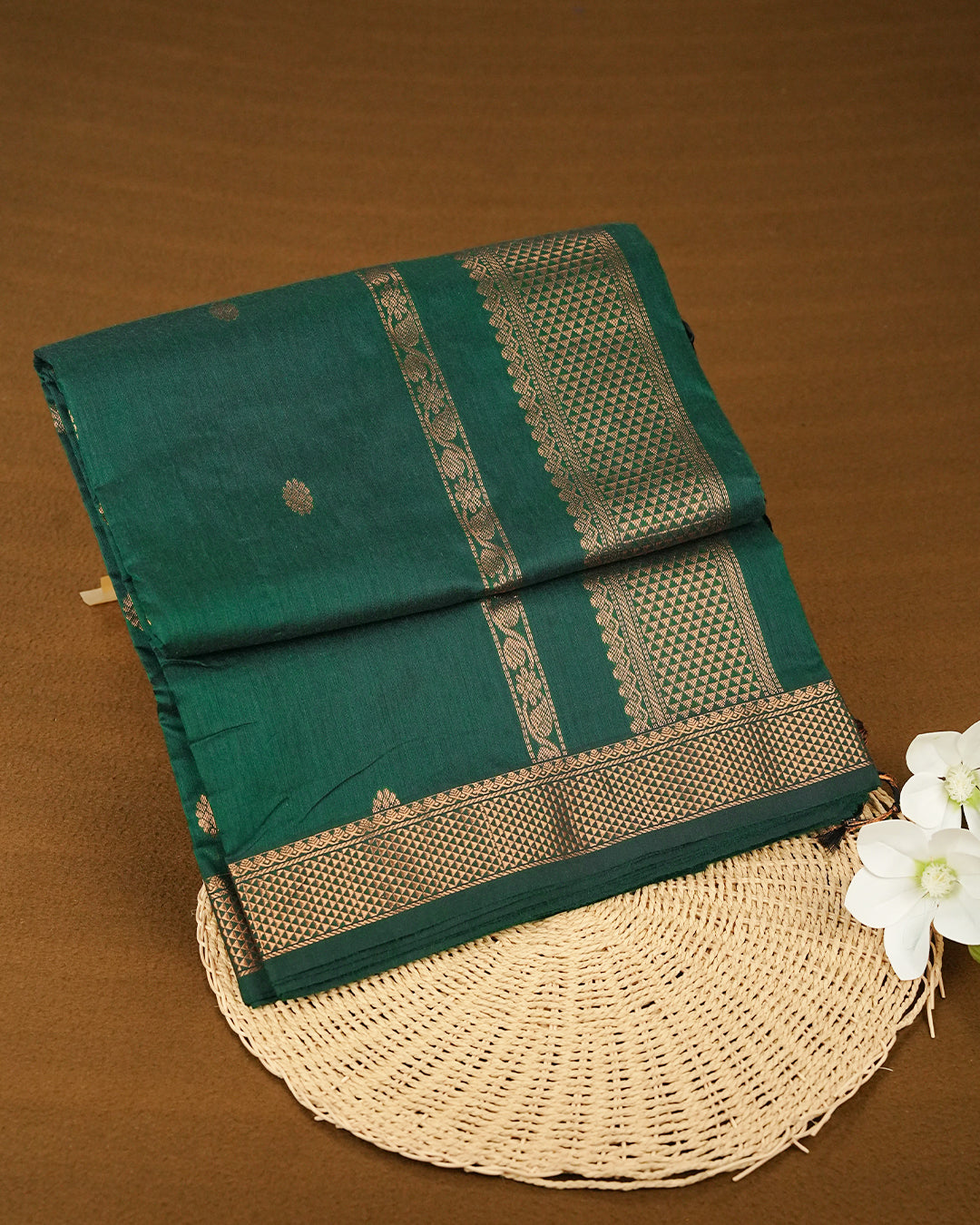 Green Colour Kalyani Cotton saree Featuring Gold Zari Motifs On Body, complemented by Contrast colour with  Gold zari border, paired with matching blouse piece