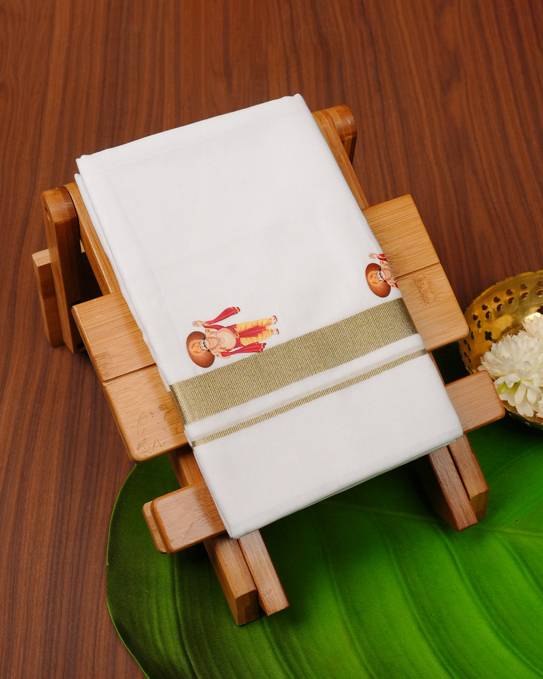 White colour cotton Double dhoti featuring Light Gold with Maveli print border.