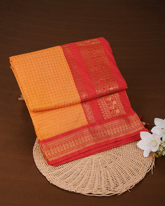Orange colour kalyani cotton saree featuring gold zari check pattern on body, complemented by Red colour with Antique zari border, paired with matching blouse piece