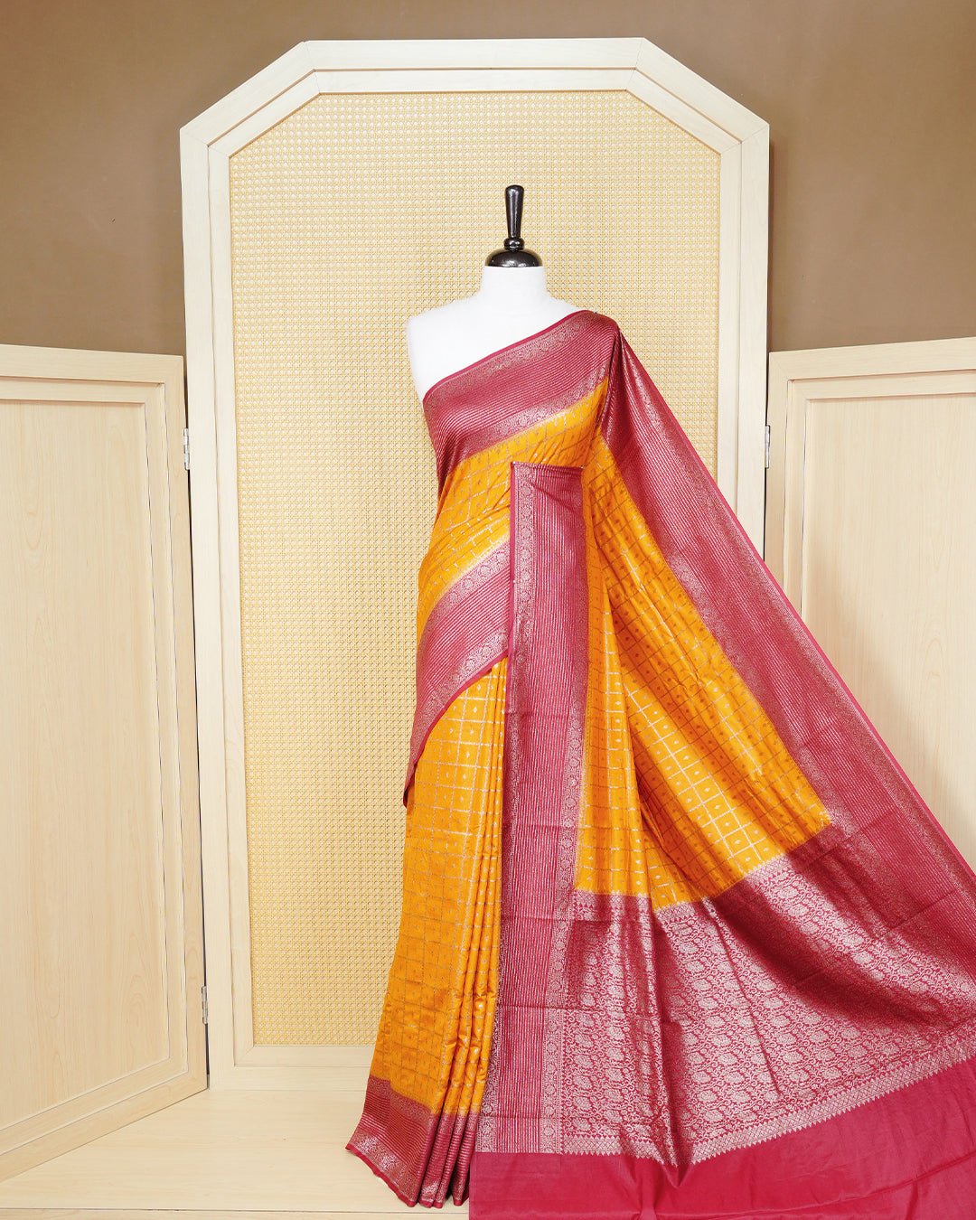 Mustard yellow Colour Semi georgette Saree having zari check with buttas pattern on body, contrast maroon colour floral designed border, Rich Pallu comes with Matching Blouse piece.