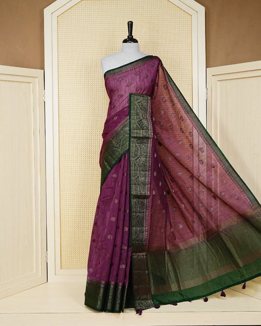 Onion pink colour semi linen saree thread motifs on body, contrast dark forest green colour gold zari border, rich pallu comes with matching blouse piece