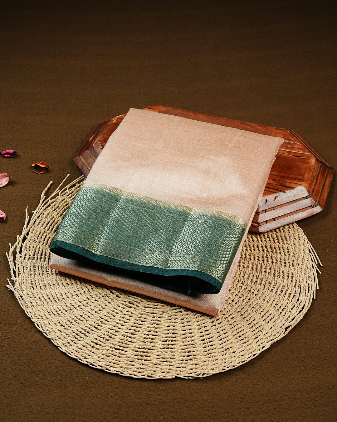 Cream colour Tussar silk saree Featuring Elegant Plain body, complemented by Contrast dark green colour with gold zari border, paired with matching blouse piece.