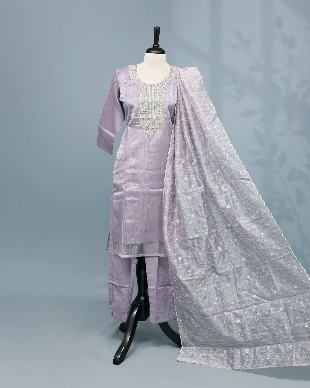 Lavender colour salwar set with Sequins & thread work on top, paired with matching bottom & Dupatta.