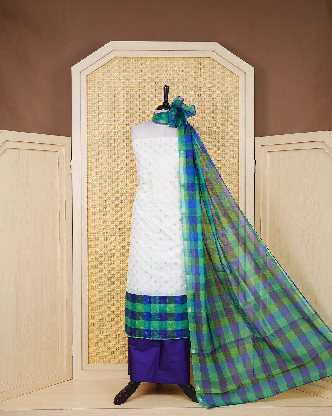 White & Navy blue Chanderi salwar material featuring Gold zari Small motifs on body and Check pattern body, paired with matching colour santoon bottom, elegant dupatta.