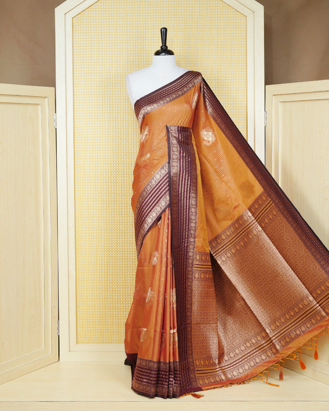 Rust orange & gold double shade Mulberry silk saree featuring floral gold zari patterns on body, paired with contrast maroon colour with traditional border, comes with matching blouse piece.